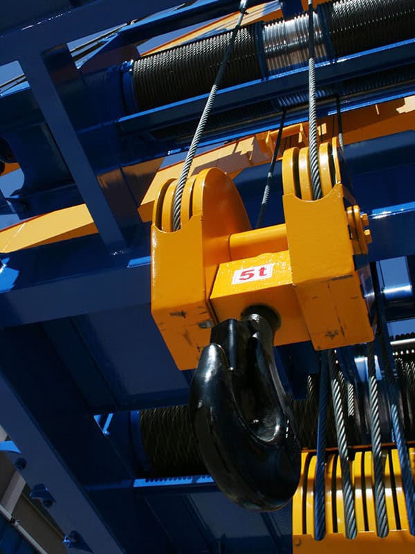 Powerful crane hook. Industrial background