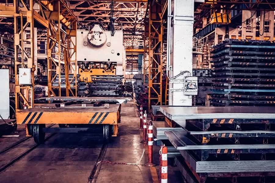 Assembly workshop at big industrial plant. Tractor assembling